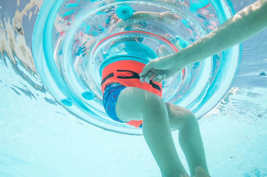 Baby's inflatable pool ring, seat and handles for infants 7- 15 kg transparent