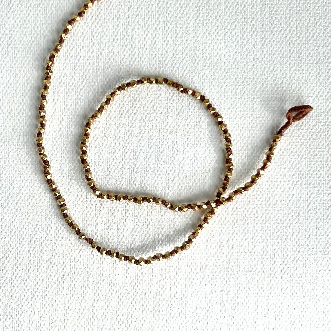 Delicate Knotted Strands