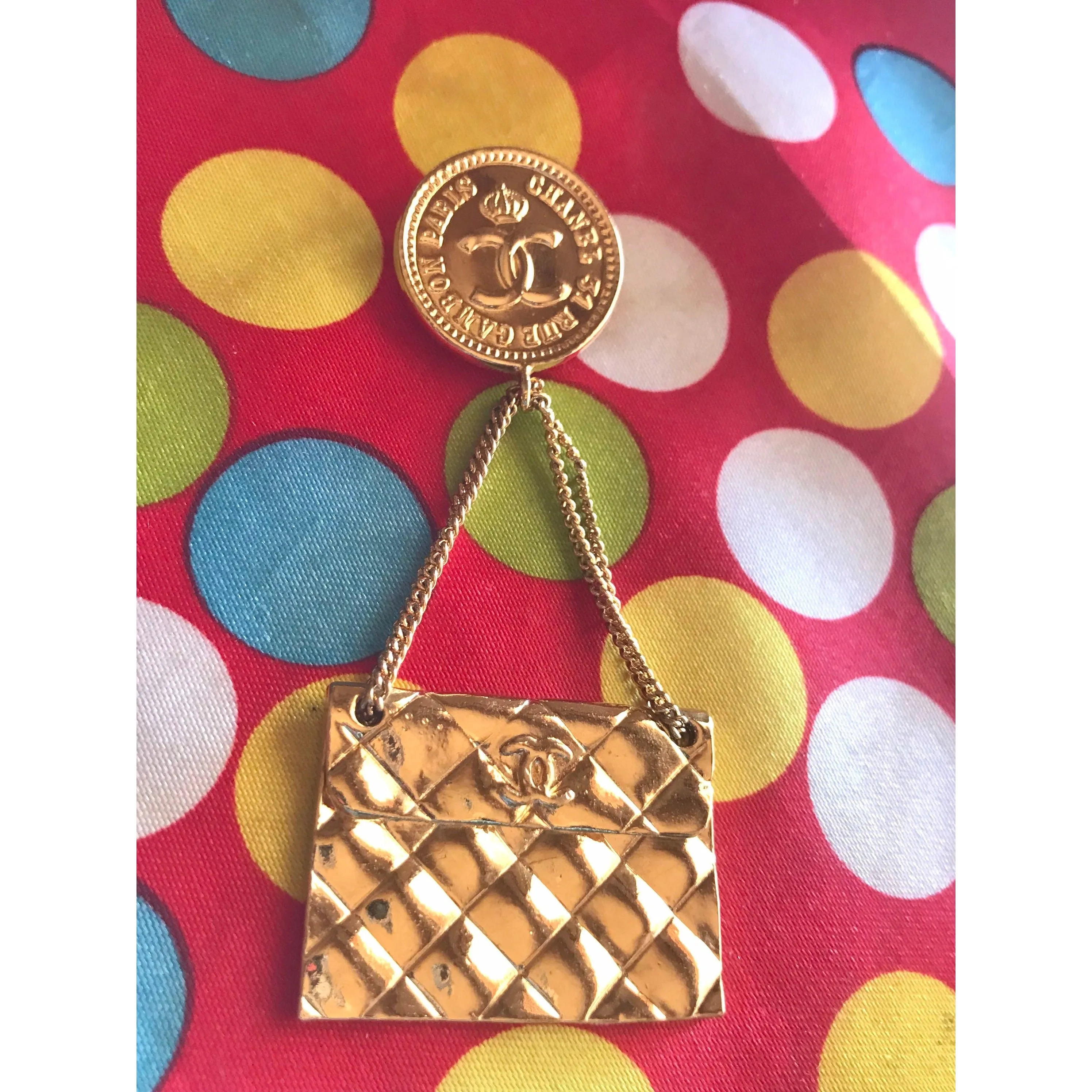 MINT. Vintage CHANEL Gold tone brooch with 2.55 classic purse and CC charms. Chic dangling brooch. Gorgeous masterpiece jewelry. 050406r4