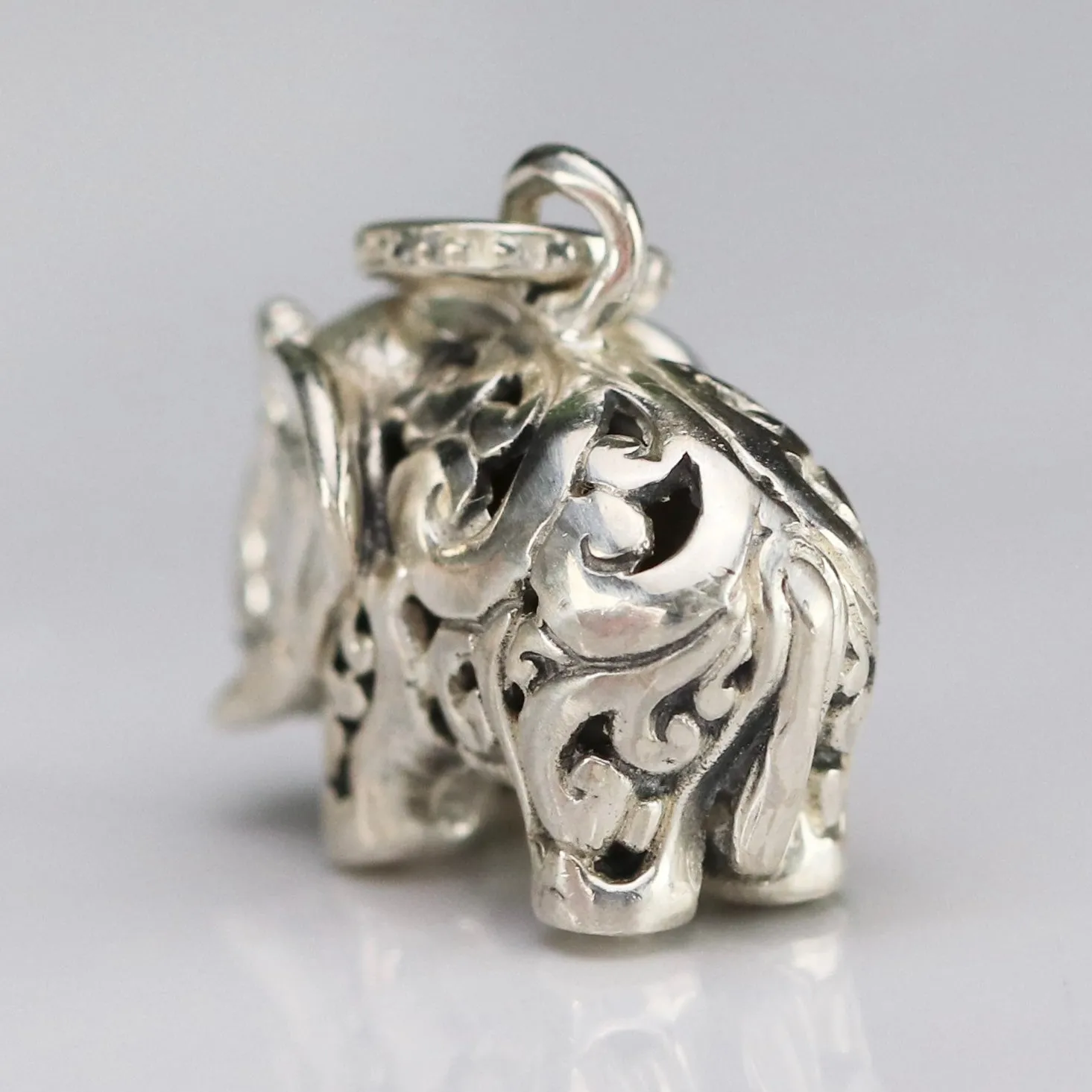 Vintage engraved puffed sterling silver elephant pendant