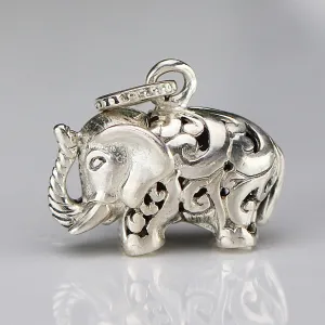 Vintage engraved puffed sterling silver elephant pendant
