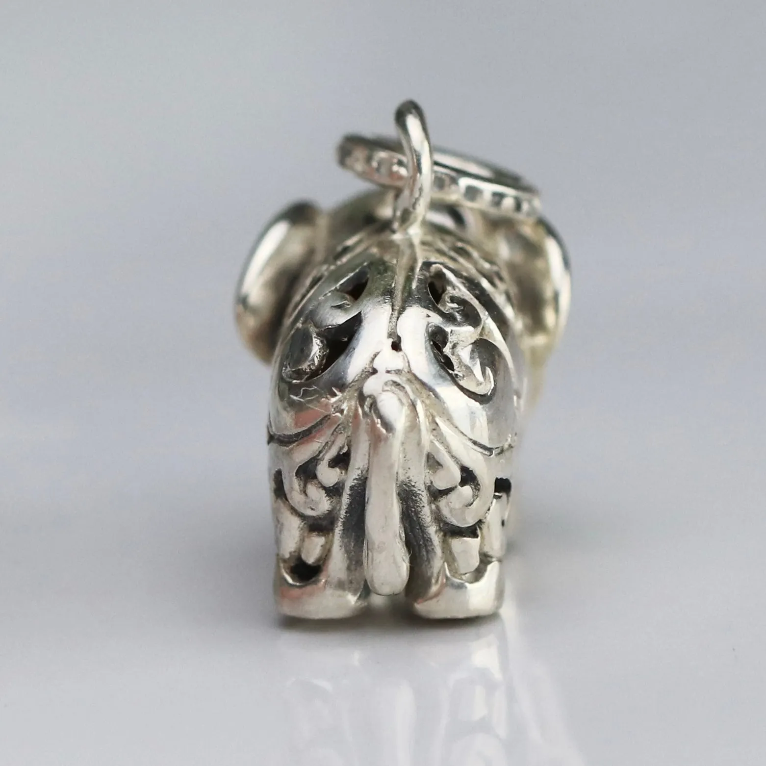 Vintage engraved puffed sterling silver elephant pendant