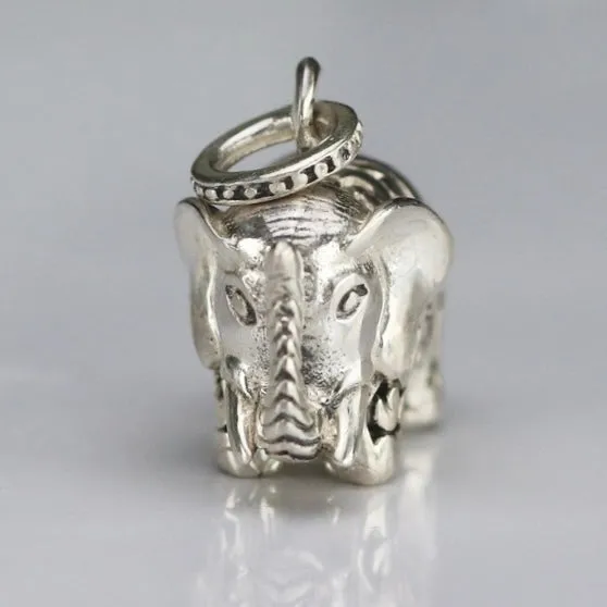 Vintage engraved puffed sterling silver elephant pendant