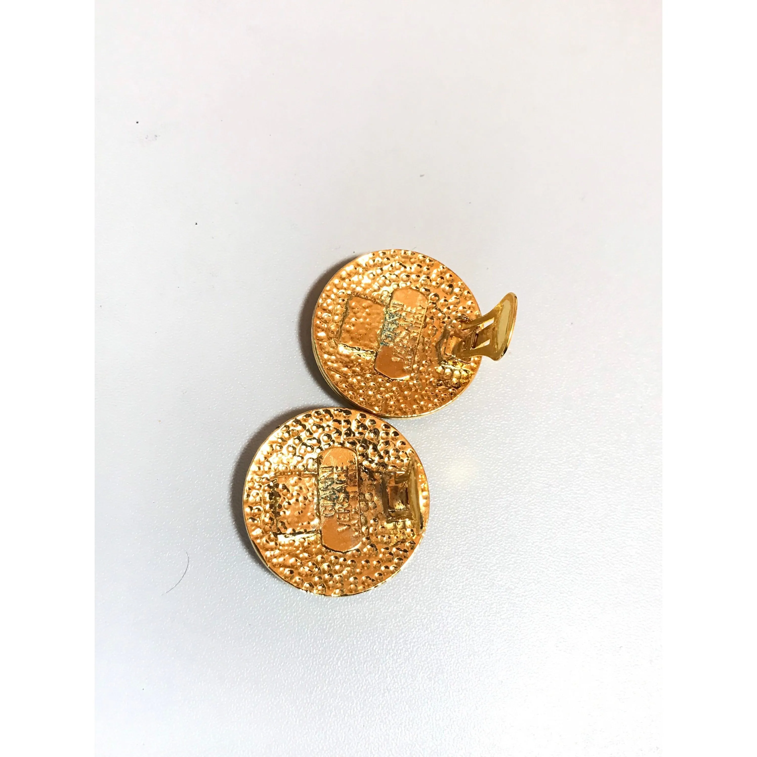 Vintage Gianni Versace round gold tone medusa face motif earrings. Must have Lady Gaga style jewelry piece. Great gift. 060523re4