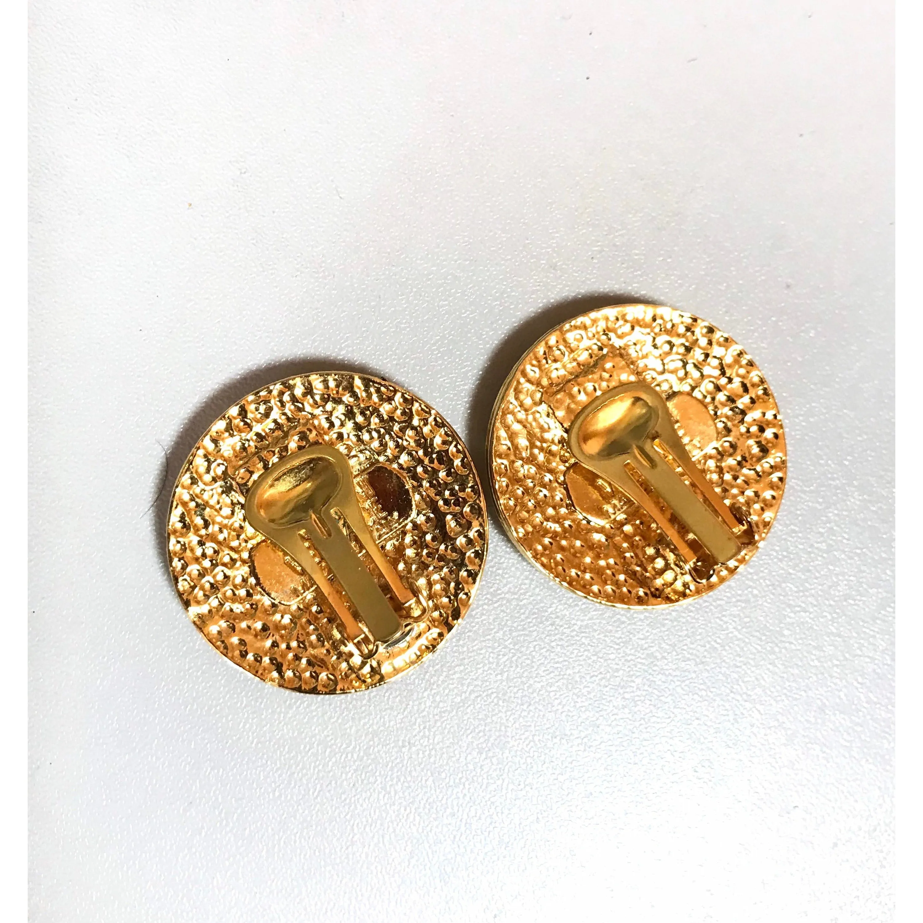 Vintage Gianni Versace round gold tone medusa face motif earrings. Must have Lady Gaga style jewelry piece. Great gift. 060523re4